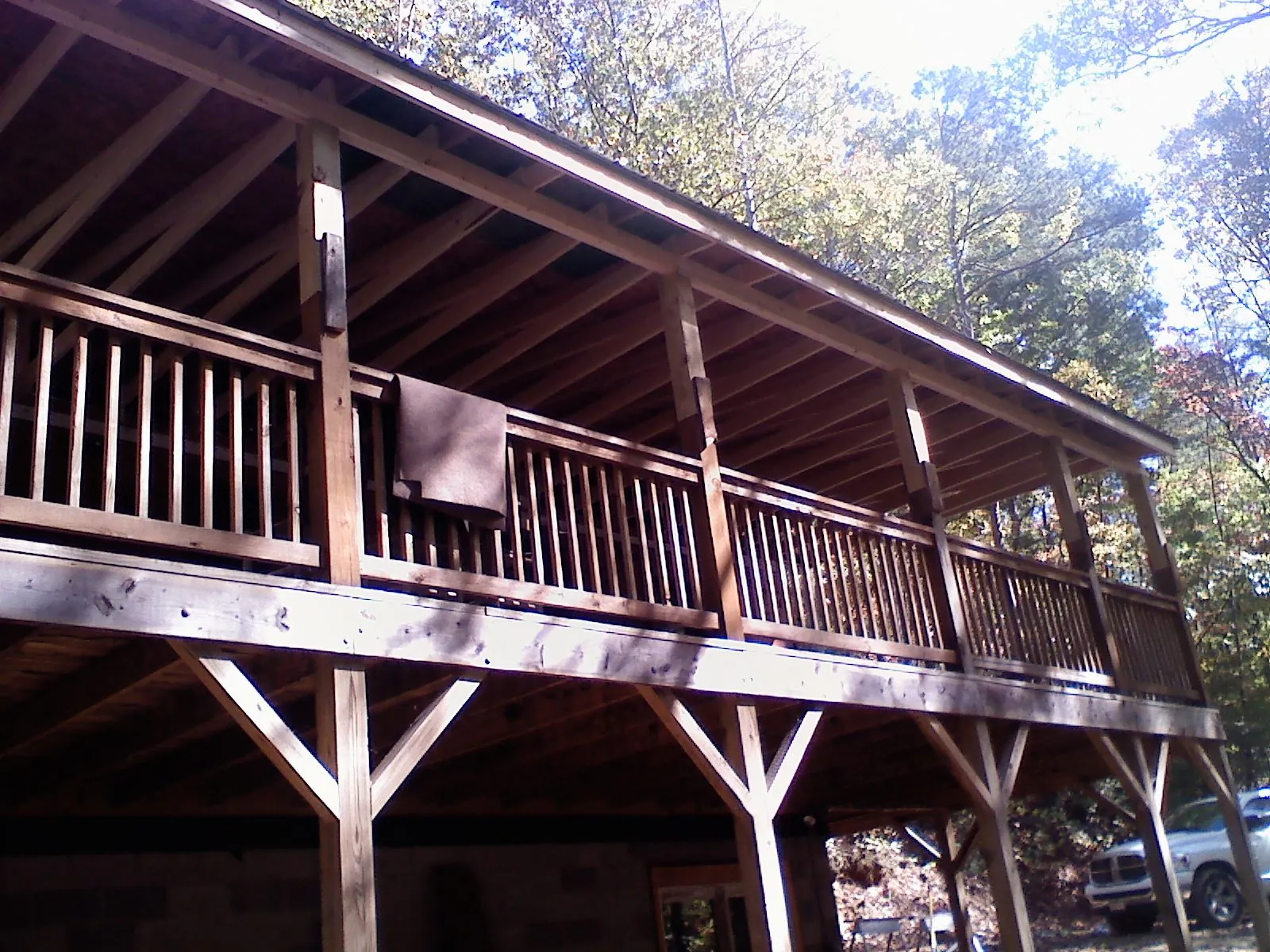 Timber framing under a new elevated porch and deck — Roof Leak Repair in Northampton by Roofing Brothers